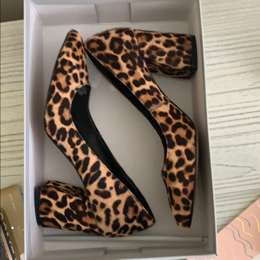 Faux fur cheetah pumps with thick heel